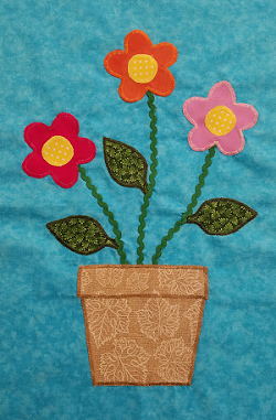 Flowers sewn on fabric